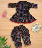 Printed black cotton blend dhoti pants and kurta set - traditional Indian girls' clothing with A-line top and short sleeves